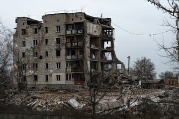 A multi-story residential building, heavily damaged after the aerial bombardment in Izyum (Izyum).