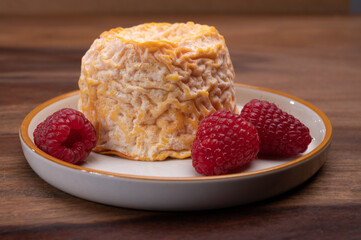 French Langres soft cows crumbly cheese with washed rind structure made in Champagne - Ardenne region