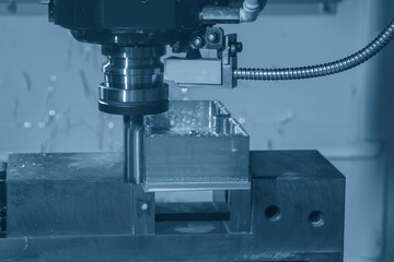 The CNC milling machine rough cutting with flat end mill tool.