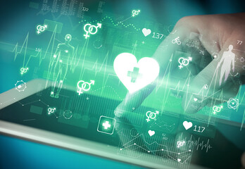 Close-up of a touchscreen with healthcare icons