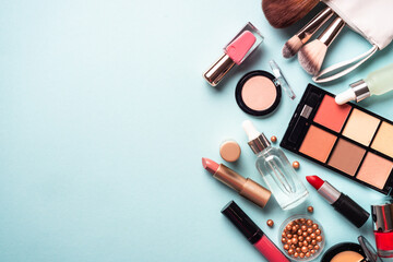 Make up professional cosmetics on blue background.