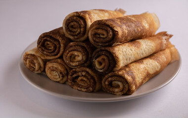 photo thin pancakes beautifully stacked on a plate