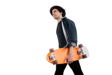 Hipster young guy walking holding a hobby skateboard, isolated transparent background.