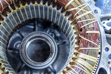 IPM-SynRM engine stator disassembled for repair. The engine is damaged by corrosion due to a coolant leak.