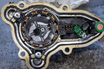 Fragment of an IPM-SynRM resolver of an engine damaged by a coolant leak.