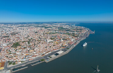 Fototapeta premium Lisbon City Downtown and City Center, Portugal. Drone Point of View. Sightseeing Places and Famous Architecture Buildings. River Tagus in Background