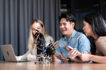 Young students researching inventions with modern technology in university libraries.