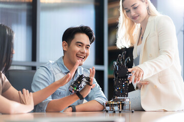 Young students researching inventions with modern technology in university libraries.