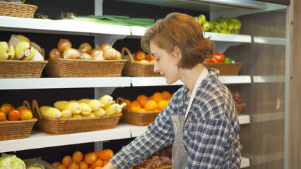 Portrait of a caucasian woman working in a supermarket or retail shop and food on grocery products. Food shopping. People lifestyle. Business service. A staff worker