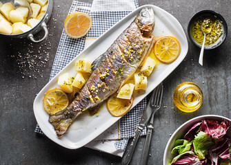 Roasted fish trout - 565945280