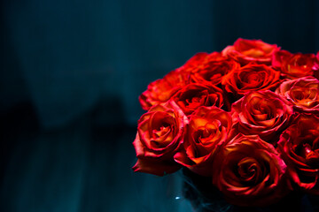 A bunch of fresh dark red roses close up for St. Valentine's Day