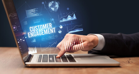 Businessman working on laptop, business concept