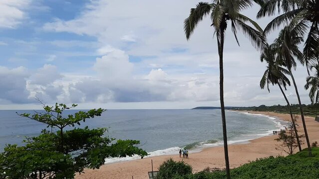 Candolim Beach in goa. monsoon clouds in Goa beach. sinquerim beach.	

