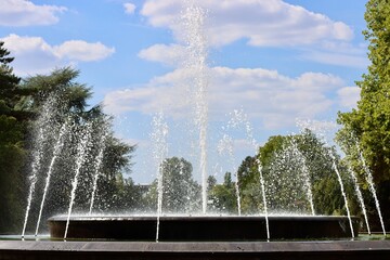Water fountain in Dusseldorf Nordpark, Germany, Europe - obrazy, fototapety, plakaty