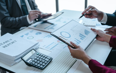 Naklejka na ściany i meble Team of businesspeople working with chart of accounts (COA) and balance sheet, stock market data, consulting asset accounts record any resources of company, anti bribery, error checking concept
