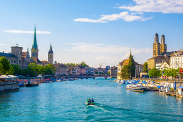 Scenic panoramic view of historic Zürich city center with famous Fraumünster and Grossmünster...