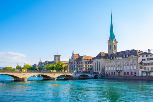 Scenic panoramic view of historic Z&uuml;rich city center with famous Fraum&uuml;nster and Grossm&uuml;nster Church and river Limmat at Lake Zurich on a beautiful sunny day with blue sky in summer, Switzerland