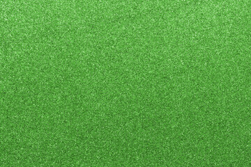 light green glitter background with reflective glitter material