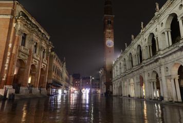Naklejka premium Night view of Vicenza City in Italy with reflections of lights