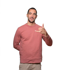 Happy young man making a gesture of calling with the hand