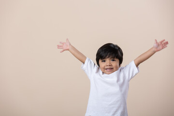 Happy Mexican little boy arms wide open
