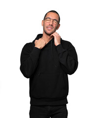 Concerned young man making a scratching gesture