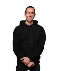 Happy young man posing against background