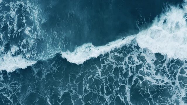 Aerial view Top down big sea waves deep blue sea  Strong winds during a storm