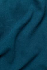 Crumpled blue fabric. Full frame photo.