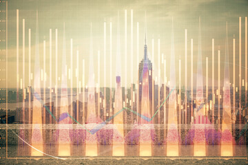 Forex graph on city view with skyscrapers background multi exposure. Financial analysis concept.