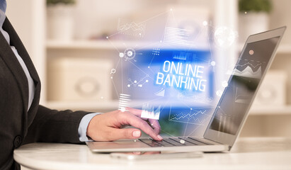 Side view of a business person working on laptop