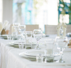 glass goblets on a festive white table