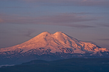 Elbrus mount in the morning light. Elbrus mount is the highest mountain peak in Russia and Europe....