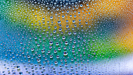 Water drops. Abstract gradient background. The texture of the drops. Multicolored gradient....