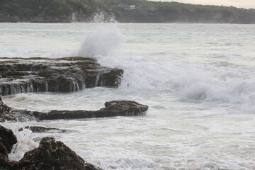 Ocean waves crashing on rocks