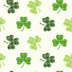 St. Patricks Day seamless pattern of clover leaves in Irish plaid texture and on isolated background. Hand drawn design for St. Paddy day celebration, party decoration, scrapbooking, home decor.