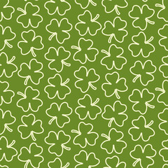 . Seamless pattern of hand drawn, doodle Irish clover leaves, on isolated background. Design for St. Paddy day celebration, party decoration, scrapbooking, home decor, textile, print.