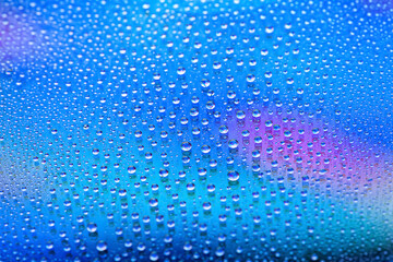 Water drops. Abstract gradient background. Drop texture. Blue gradient. A highly textured image. Shallow depth of field. Selective focu