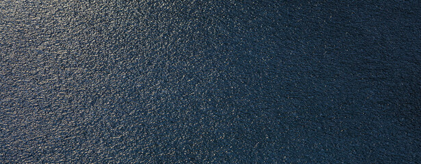 ice textures on frozen water,abstract blue background,grunge background with space,art background for design with cooy space,