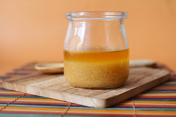 homemade ghee in container on a table ,