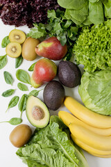 Various fruits and lettuce salad mix
