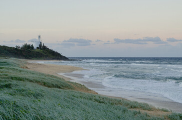 Sunset at the dog beach with the lighthouse of Point Cartwright Mooloolaba Kawana Queensland...