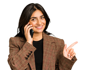Young indian business woman calling with mobile phone isolated