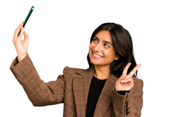 Young indian business woman taking herself a selfie with a mobile phone