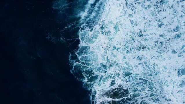 Top view dark blue sea water wave Big wave in black sea Top-down form aerial view Drone high quality camera.