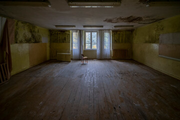  An old school in an abandoned manor house in central Poland, Europe in autumn