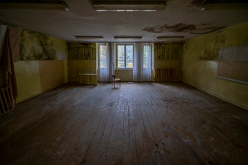  An old school in an abandoned manor house in central Poland, Europe in autumn