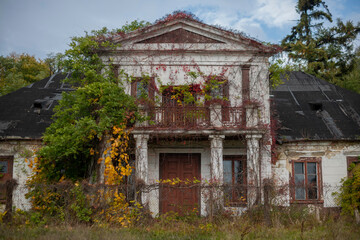 An old school in an abandoned manor house in central Poland, Europe in autumn