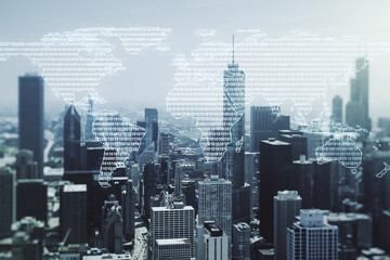 Double exposure of abstract digital world map on Chicago city skyscrapers background, research and...