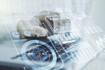 Double exposure of abstract creative statistics data hologram with hands typing on laptop on background, statistics and analytics concept